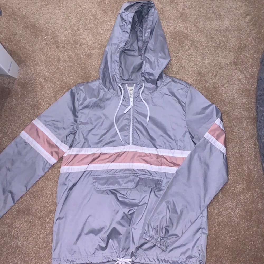 Windbreaker with hood and convenient front pocket